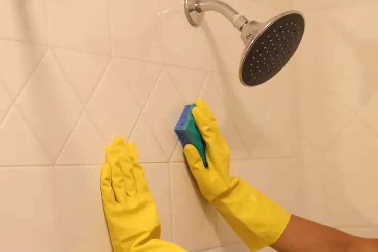image of cleaning bathroom wall
